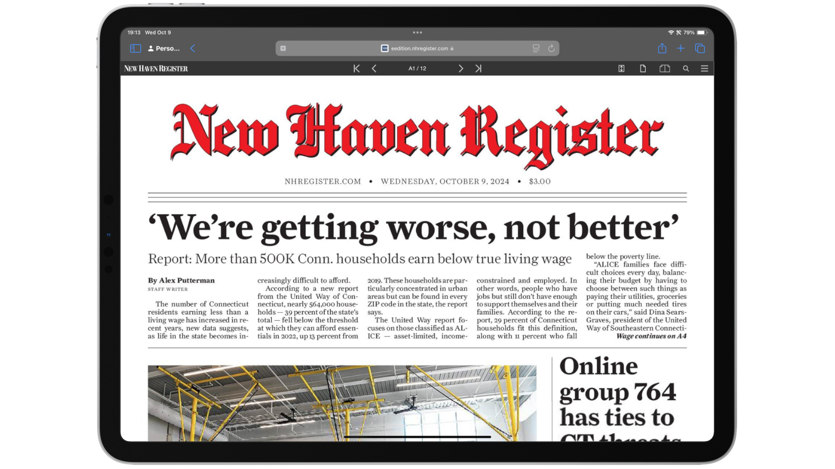 Image of an iPad showing the digital edition of the New Haven Register in the browser.
